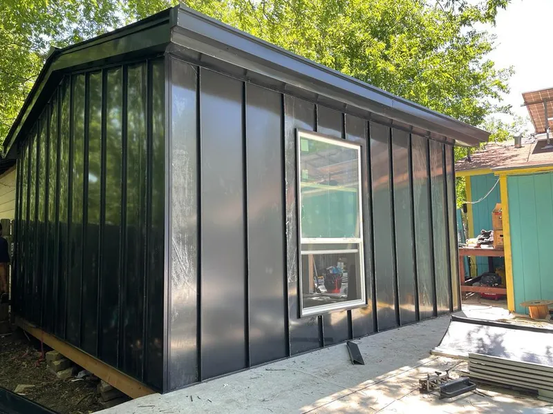 Black standing seam metal wall panels for Metal Roof Installation in Blue Springs