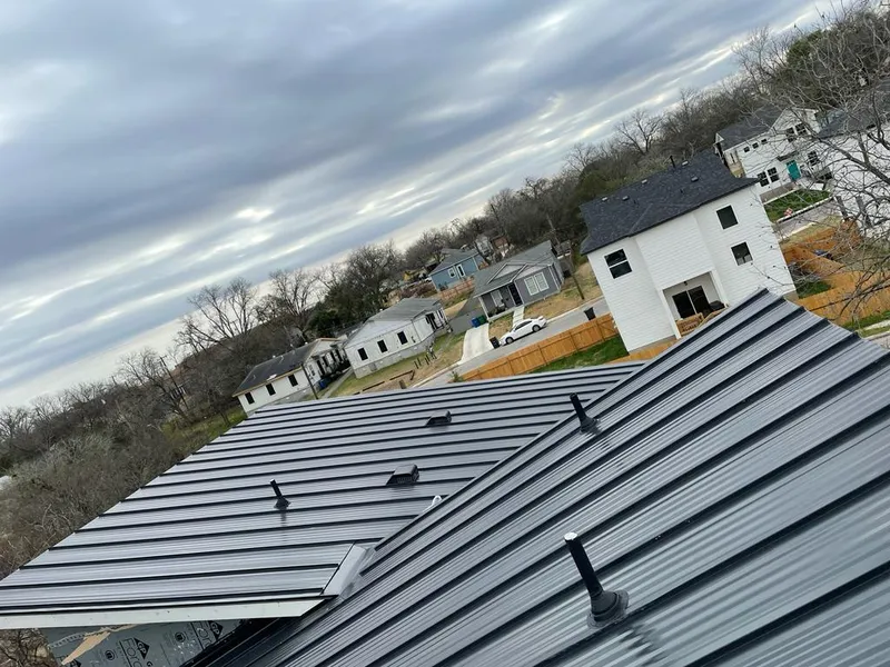 Standing seam metal roof panels with vents for Skylight Repair in Blue Springs
